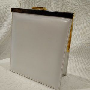 White leather clamshell clutch by Brown's
